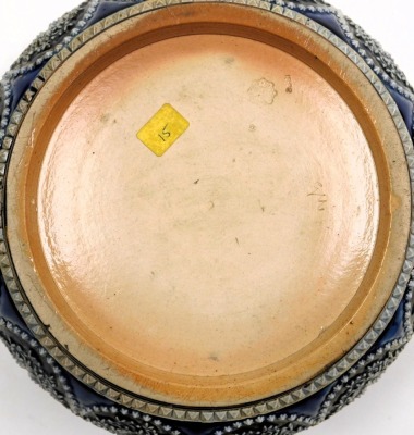 A late 19thC Doulton Lambeth stoneware bowl, with silver mount, sprigged with repeating bands of leaves and stylised flowers, impressed marks, Sheffield 1882, 22cm wide. - 2