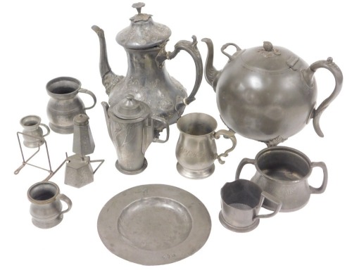 A group of 19thC and later pewter and plate, including a teapot, crested dish, bearing London touch mark, Kyserzinn Art Nouveau coffee pot, decorated with snowdrops, number 4613, three piece cruet set, and tankards. (a quantity)