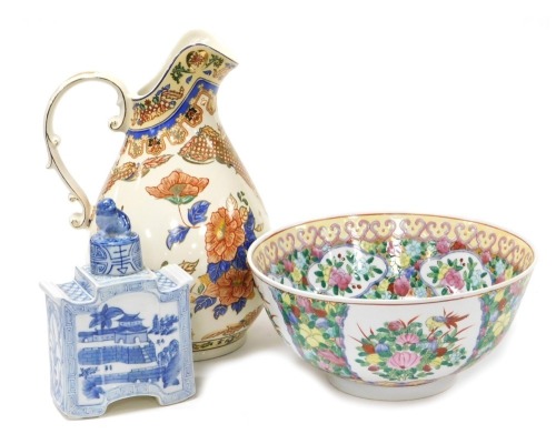 A 20thC Chinese famille rose porcelain goldfish bowl, decorated with flowers, 31cm wide, a Panda pottery wash jug, decorated with flowers, gilt heightened, printed mark, 36cm high, and a blue and white tea caddy decorated with The Walled City, 22cm wide.