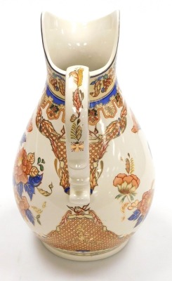 A 20thC Chinese famille rose porcelain goldfish bowl, decorated with flowers, 31cm wide, a Panda pottery wash jug, decorated with flowers, gilt heightened, printed mark, 36cm high, and a blue and white tea caddy decorated with The Walled City, 22cm wide. - 3