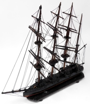 A wooden scale model of a four masted sailing ship, fully rigged, without sails, raised on an integral base, 65cm wide. - 2