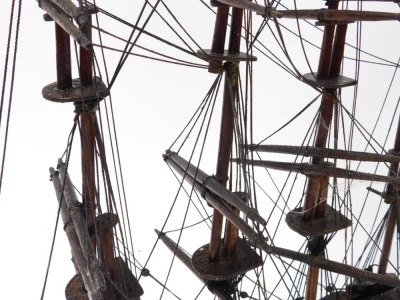 A wooden scale model of a four masted sailing ship, fully rigged, without sails, raised on an integral base, 65cm wide. - 4