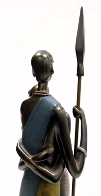 A plaster figure of an African tribesman, in embrace with his wife, and holding a spear, 56.5cm high. - 3