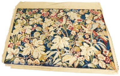 An RBC Tapestrie d'Paris wall hanging, decorated with flowers, 174cm x 117cm.