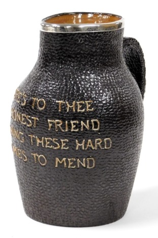 A late 19thC Doulton Lambeth Stoneware Blackjack jug, with silver rim, bearing "Here's to Thee, My Honest, My Honest Friend, My Honest, Wishing These Hard Times To Mend", manufactured for Sidney W Allen, 39 White Rock, Hastings, impressed marks, London 18