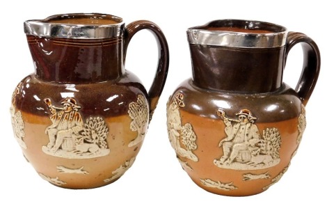 Two late 19thC Doulton Lambeth Stoneware two tone harvest jugs, with silver rims, impressed marks, London 1890 and 1895, 14cm high.