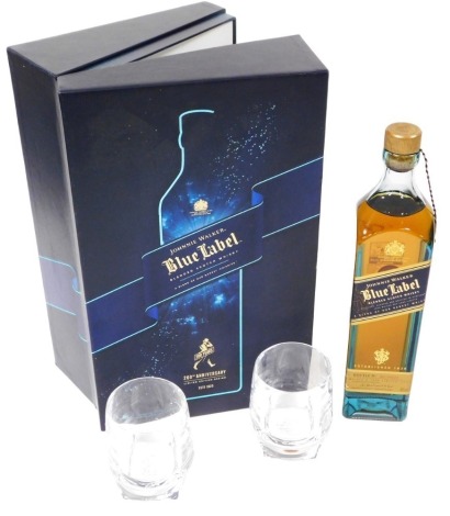 A Johnnie Walker Blue Label 200th Anniversary box set, limited edition, comprising a 70cl bottle of blended Scotch whisky, bottle number IBO04929, and a pair of whisky glasses, boxed.