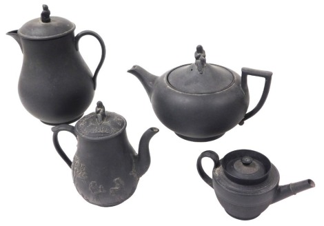 A group of Wedgwood black basalt teapots, impressed marks. (4)