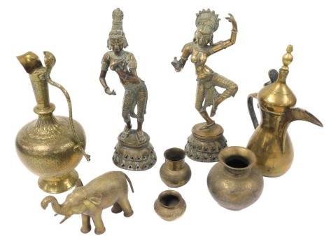 A group of Eastern brassware, including an Indian ewer with a cobra handle, two Thai dancing figures, a Turkish coffee pot, and an elephant. (a quantity)