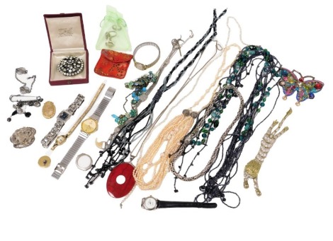 A group of silver and costume jewellery, including a paste set brooch, Gucci stainless steel cased lady's wristwatch, further dress watches, a silver neck chain, paste set lion brooch, cultured and seed pearl necklace, and a Victorian gold plated photo lo