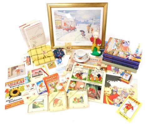 A group of Rupert the Bear collectables, including B Bott (Caroline G) The Life and Works of Alfred Bestall, 2 vols, teacup and saucer, limited edition print of Nutwood Christmas Eve, yellow wool scarf, tie, pin badges, and favourite story books. (a quant