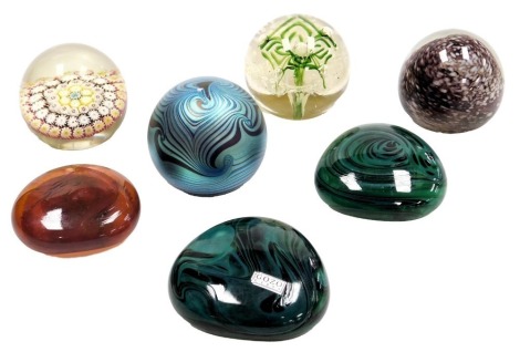 A group of glass paperweights, including Okra, Gozo, and a millefiori weight. (7)