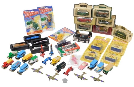 Lledo and Matchbox diecast vehicles, including buses, fire appliances and agricultural machinery, together with Matchbox Thunderbirds blister packs containing Thunderbird 2, Thunderbird 4, and The Hood. (a quantity)