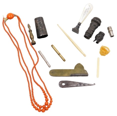 A group of jewellery and virtue, including a French mother of pearl handled seal, walking cane top and ferrule, brass and steel fleam, coral beads, etc.