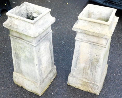 A pair of Victorian cream stoneware chimney pots, of square form, 83cm high.