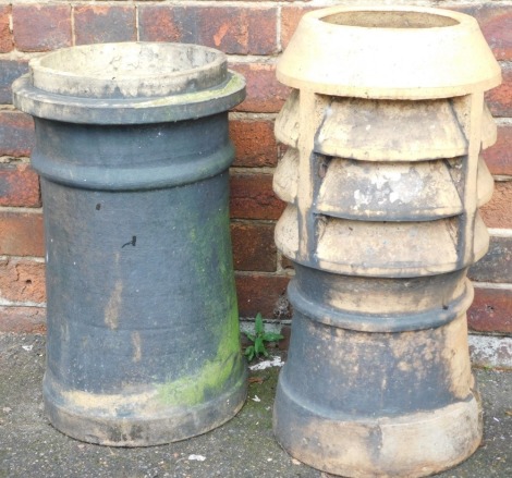 An early 20thC terracotta chimney pot, 61cm high, and a further chimney pot, 53.5cm high. (2)