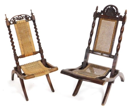 A Victorian beech folding chair, with cane seat and back, and another similar. (2)