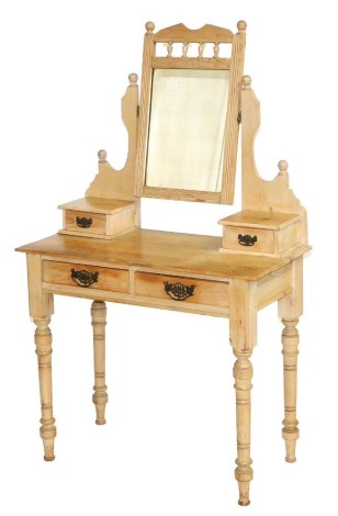 A Victorian pine dressing table, with a swing frame mirror, within a frame of two drawers, above two frieze drawers, raised on turned legs, 145cm high, 86cm wide, 42cm deep.