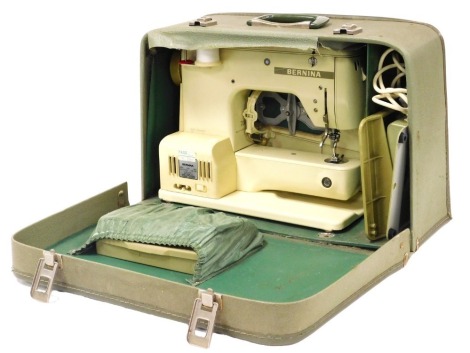 A Bernina electric sewing machine, model 708, cream cased, serial number 68138897, cased.