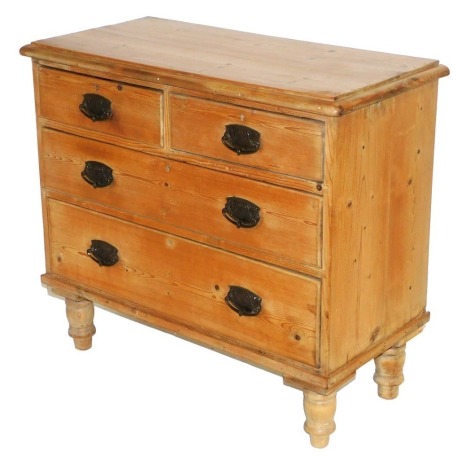 A Victorian pine chest, of two short over two long drawers, raised on turned feet, 79cm high, 89cm wide, 42.5cm deep.