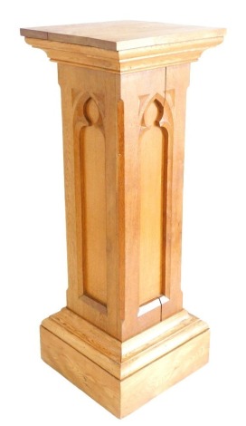 A Victorian Gothic oak lectern stand, with carved sides, raised on a plinth base, 120cm high, 44.5cm wide, 45cm deep.