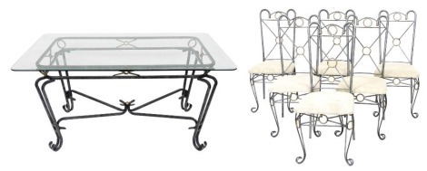 A Bentley Designs cast iron dining table, with a canted rectangular glass top, raised on four scroll legs united by an under tier, 74cm high, 152cm wide, 91cm deep, together with six cast iron dining chairs, with overstuffed cushion seats.