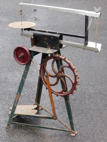 A vintage Hobbies gem treadle saw.