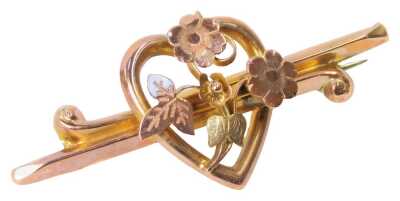 A Victorian two colour metal brooch, of heart and floral form, stamped 9ct, 2.0g.