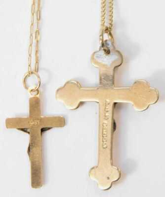 A 9ct gold crucifix pendant, on a fine curb link neck chain, and a further crucifix pendant on chain, 3.6g. - 2