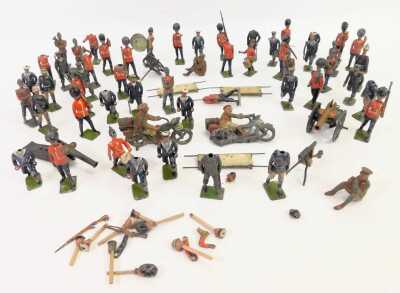 W Britain lead soldiers, to include World War I era motorcycle and dispatch rider, King's Guard, cannon, medical stretcher, etc. (AF, 1 box)