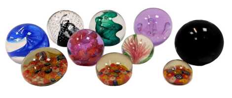 A group of glass paperweights, to include Caithness Carnival, 6.5cm high, Caithness Brimston, etc. (10)