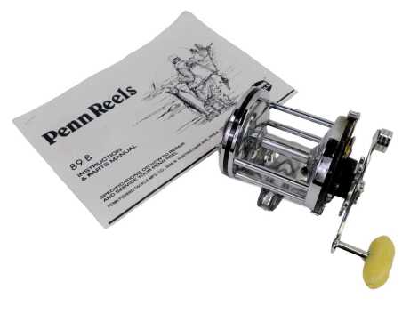 A Penn Squidder fishing reel, number 145, with instruction and parts manual.