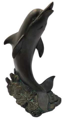 A Gare pottery figure modelled as a dolphin, on a seabed coral base, stamped Gare Inc 95, 28cm high.