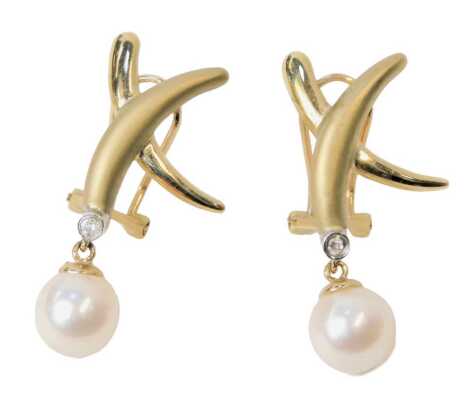 A pair of 9ct two colour gold earrings, with a diamond and cultured pearl drop, 4.2g.