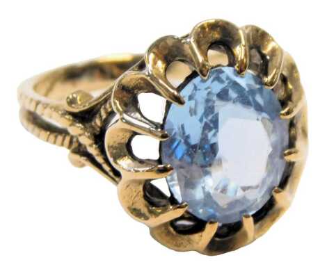 A 9ct gold and aquamarine ring, in an oval basket setting, size P, 6.1g.