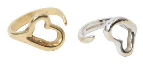 A 9ct two colour gold double ring, of heart shaped form, size I, 8.5g.