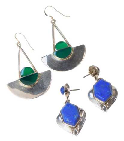 A pair of silver and lapis lazuli earrings, and a pair of silver and green enamel earrings. (2)