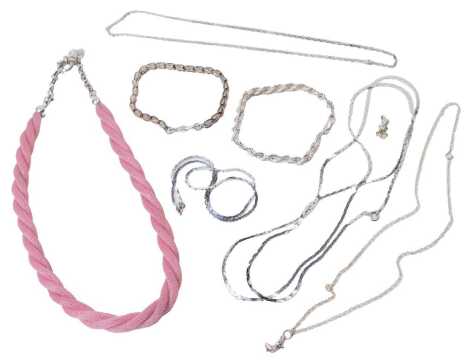 A group of silver jewellery, including neck chains, and a pink mesh and silver necklace. (6)