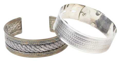 A silver belt and buckle bangle, and a Suarti cuff of woven design, 52.9g. (2)