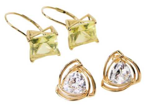 A pair of earrings, in an openworks setting, stamped 14k, and a pair of lemon quartz earrings, in yellow metal, stamped 9k. (2)