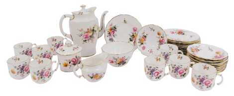 A Royal Crown Derby porcelain Derby Posies part coffee service, comprising a coffee pot, milk jug, lidded sugar bowl, open sugar bowl, nine coffee cups, nine saucers, twelve side plates.