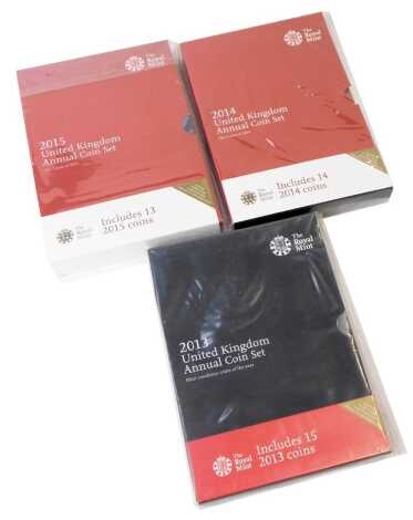 Three Royal Mint United Kingdom Annual Coin Sets, for 2014, 2015 and 2013.