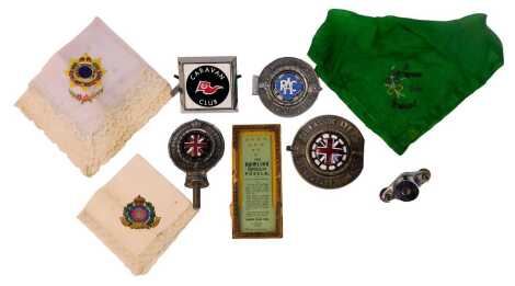 A Royal Automobile Club Association cast metal and enamel car mascot, CZ5004Z, together with two car badges for the RAC, a Caravan Club badge, etc. (1 tray)