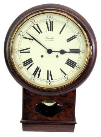 A 20thC mahogany and burr wood cased drop dial wall clock, the circular dial bearing Arabic and Roman numerals for Comitti of London, eight day movement, with key and pendulum, 40cm high.