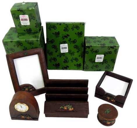 A group of John Deere collectables, to include notepad, holder, photograph frame, mantel clock, letter rack, etc., some boxed.