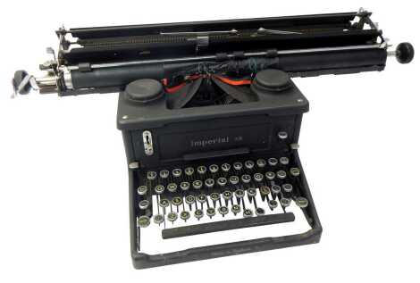 An Imperial 58 typewriter, with cover.