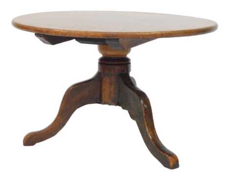 A 19thC mahogany occasional table, cut down, the circular top on a turned column with three cabriole legs, 39cm high, the top 59cm diameter.