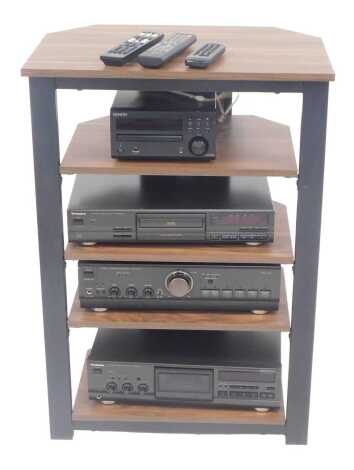 A Technic sound system, comprising a compact disc player and a stereo cassette deck, together with a Denon CD receiver, a Moss Class AA stereo integrated amplifier, contained in a five tier unit, 86cm high, 60cm wide, 40cm deep.