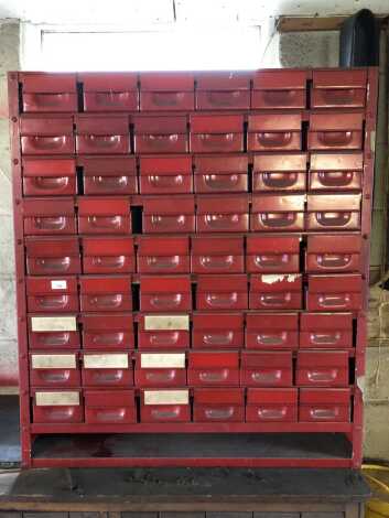 A red steel parts bin cabinet, 104cm high, 92cm wide, 44cm deep.