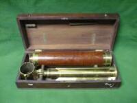 A brass and mahogany 5-draw telescope by Adams